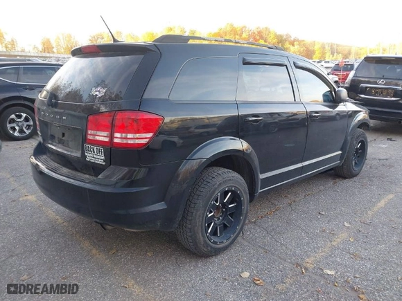 2018 Dodge Journey SE with VIN 3C4PDCAB8JT295146, listed as a IAAI auction lot 40641374 with 112,206 mi miles. Bid and sale history available at carsss.com. Image 4.