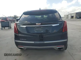 2021 Cadillac XT5 FWD Premium Luxury z VIN 1GYKNCR41MZ174477, wystawiony jako Copart lot #54335615 z przebiegiem 39 158 mil mil oraz Szkody całkowita. Historia ofert i sprzedaży dostępna na DreamBid. Obrazek 6.