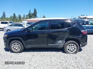 2018 Jeep Compass Sport with VIN 3C4NJDAB1JT261863, listed as a IAAI auction lot 42677037 with 93,263 mi miles and . Bid and sale history available at DreamBid. Image 14.