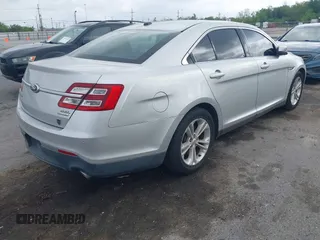2013 Ford Taurus SEL with VIN 1FAHP2E81DG129229, listed as a IAAI auction lot 41898917 with 205,865 mi miles. Bid and sale history available at carsss.com. Image 4.