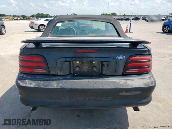 1995 Ford Mustang with VIN 1FALP4443SF210871, listed as a Copart auction lot 61627625 with 132,696 mi miles and Clean title. Bid and sale history available at DreamBid. Image 6.