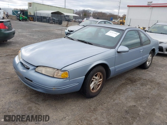 1997 Ford Thunderbird LX z VIN 1FALP62W2VH105702, wystawiony jako IAAI lot #41713980 z przebiegiem 90 775 mil mil oraz . Historia ofert i sprzedaży dostępna na DreamBid. Obrazek 2.