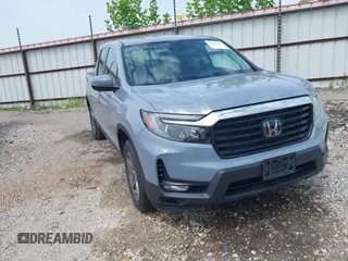 2023 Honda Ridgeline RTL z VIN 5FPYK3F57PB056747, wystawiony jako IAAI lot #42266966 z przebiegiem 17 002 mil mil oraz . Historia ofert i sprzedaży dostępna na DreamBid. Obrazek 1.