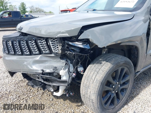 2021 Jeep Grand Cherokee Laredo E with VIN 1C4RJFAG4MC700384, listed as a IAAI auction lot 42192672 with 54,525 mi miles and . Bid and sale history available at DreamBid. Image 6.