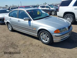 2000 BMW 3 Series 323i with VIN WBAAM3349YFP76240, listed as a IAAI auction lot 41760044 with 120,884 mi miles. Bid and sale history available at carsss.com. Image 1.