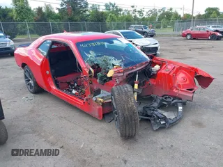 2016 Dodge Challenger 392 Hemi Scat Pack Shaker z VIN 2C3CDZFJ3GH322969, wystawiony jako IAAI lot #42334840 z przebiegiem Nie podano mil oraz . Historia ofert i sprzedaży dostępna na DreamBid. Obrazek 1.