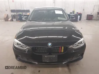 2014 BMW 3 Series 328i xDrive with VIN WBA3B3C5XEJ980450, listed as a IAAI auction lot 42078717 with 108,763 mi miles. Bid and sale history available at carsss.com. Image 6.