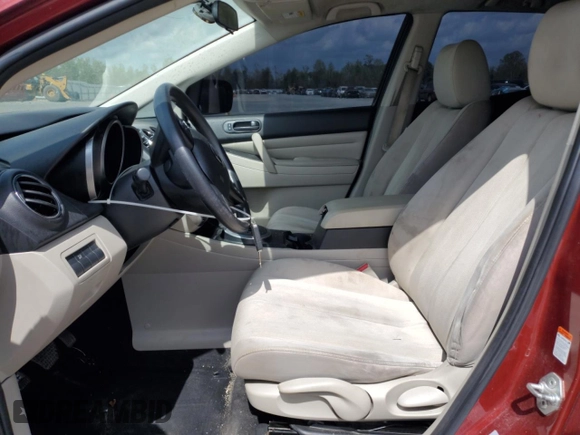 2010 Mazda CX-7 SV z VIN JM3ER2W55A0320322, wystawiony jako Copart lot #51959445 z przebiegiem 242 091 mil mil oraz Szkoda całkowita • Salvage title. Historia ofert i sprzedaży dostępna na DreamBid. Obrazek 7.