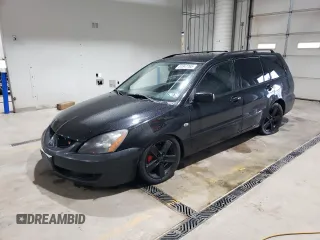 2004 Mitsubishi Lancer z VIN JA3AD29F44U024617, wystawiony jako Copart lot #51847765 z przebiegiem 172 585 mil mil oraz Szkoda całkowita • Salvage title. Historia ofert i sprzedaży dostępna na DreamBid. Obrazek 1.