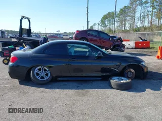 2015 BMW M4 with VIN WBS3U9C56FP967590, listed as a IAAI auction lot 41732730 with 48,927 mi miles and . Bid and sale history available at DreamBid. Image 12.