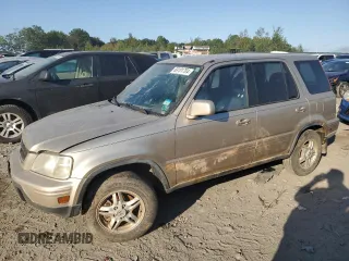 2000 Honda CR-V SE with VIN JHLRD1871YC038420, listed as a Copart auction lot 69101704 with 196,581 mi miles and Salvage Title. Bid and sale history available at carsss.com. Image 1.