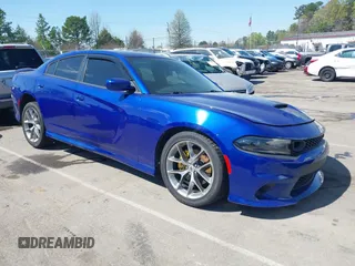 2021 Dodge Charger GT with VIN 2C3CDXHG2MH565710, listed as a IAAI auction lot 41870602 with 48,935 mi miles and . Bid and sale history available at DreamBid. Image 1.