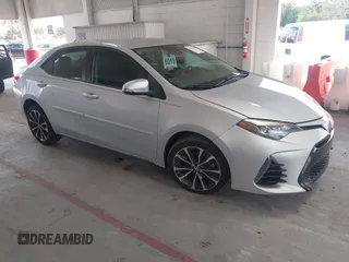 2017 Toyota Corolla L z VIN 2T1BURHE9HC894826, wystawiony jako IAAI lot #42765227 z przebiegiem 126 130 mil mil oraz . Historia ofert i sprzedaży dostępna na DreamBid. Obrazek 1.