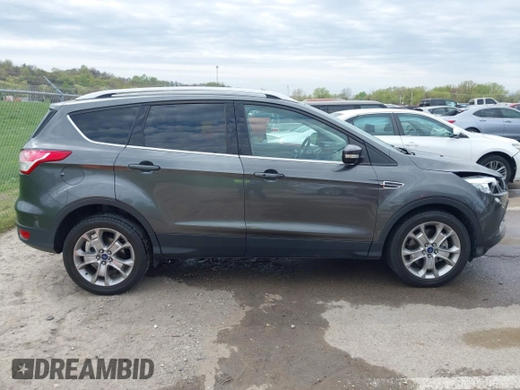 2015 Ford Escape Titanium with VIN 1FMCU0J90FUA25086, listed as a IAAI auction lot 41993681 with 126,170 mi miles. Bid and sale history available at carsss.com. Image 13.