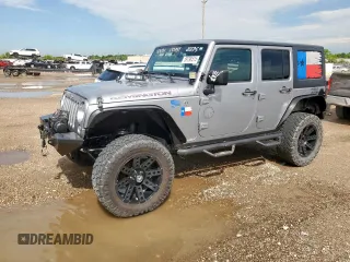 2016 Jeep Wrangler Unlimited Sport z VIN 1C4HJWDG9GL106580, wystawiony jako Copart lot #59798515 z przebiegiem 172 865 mil mil oraz Szkoda całkowita • Salvage title. Historia ofert i sprzedaży dostępna na DreamBid. Obrazek 1.