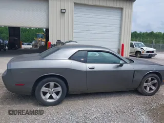 2011 Dodge Challenger z VIN 2B3CJ4DG9BH570295, wystawiony jako IAAI lot #42288192 z przebiegiem 162 094 mil mil oraz . Historia ofert i sprzedaży dostępna na DreamBid. Obrazek 13.
