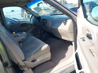2001 Ford F-150 XL z VIN 1FTRX18WX1NA13022, wystawiony jako IAAI lot #41954491 z przebiegiem 126 284 mil mil oraz . Historia ofert i sprzedaży dostępna na DreamBid. Obrazek 5.