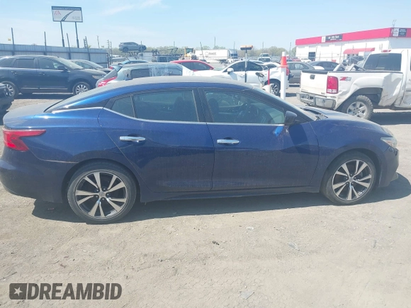 2016 Nissan Maxima SV z VIN 1N4AA6AP3GC386959, wystawiony jako IAAI lot #41886544 z przebiegiem 155 362 mil mil oraz . Historia ofert i sprzedaży dostępna na DreamBid. Obrazek 13.