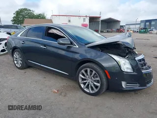 2017 Cadillac XTS Luxury z VIN 2G61M5S38H9162797, wystawiony jako IAAI lot #41921355 z przebiegiem 74 920 mil mil oraz . Historia ofert i sprzedaży dostępna na DreamBid. Obrazek 1.