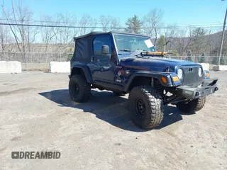 2003 Jeep Wrangler Sport with VIN 1J4FA49S03P343285, listed as a IAAI auction lot 41823684 with 201,723 mi miles. Bid and sale history available at carsss.com. Image 1.
