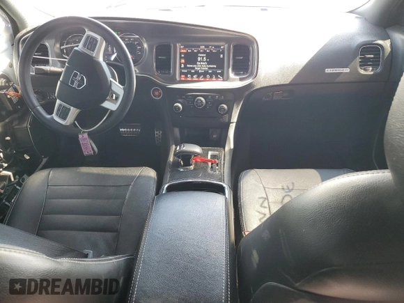 2013 Dodge Charger SE z VIN 2C3CDXBG3DH549962, wystawiony jako Copart lot #55110985 z przebiegiem 183 071 mil mil oraz Szkoda całkowita • Salvage title. Historia ofert i sprzedaży dostępna na DreamBid. Obrazek 8.