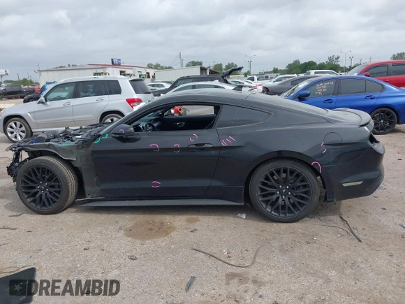 2021 Ford Mustang GT with VIN 1FA6P8CF8M5137318, listed as a IAAI auction lot 41934683 with 62,473 mi miles and . Bid and sale history available at DreamBid. Image 14.