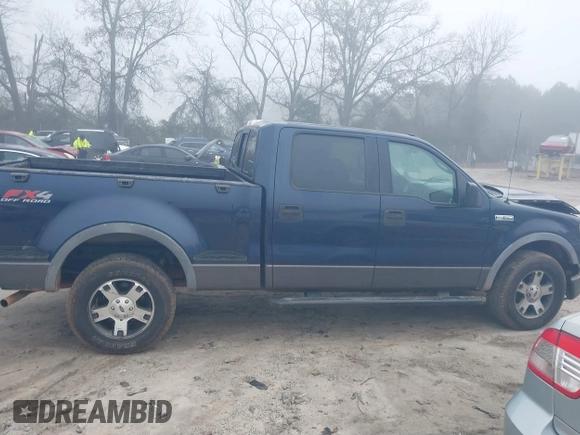 2006 Ford F-150 XLT with VIN 1FTPW04536KC60389, listed as a IAAI auction lot 41137982 with 218,741 mi miles. Bid and sale history available at carsss.com. Image 13.