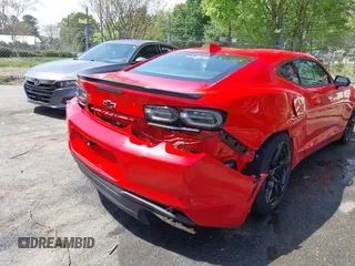 2020 Chevrolet Camaro 1LT with VIN 1G1FB1RX1L0113401, listed as a IAAI auction lot 42018427 with 61,603 mi miles and . Bid and sale history available at DreamBid. Image 6.