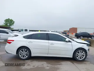 2014 Toyota Avalon Limited z VIN 4T1BK1EB6EU098479, wystawiony jako IAAI lot #42171736 z przebiegiem 92 290 mil mil oraz . Historia ofert i sprzedaży dostępna na DreamBid. Obrazek 14.