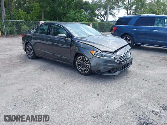 2018 Ford Fusion Titanium with VIN 3FA6P0D9XJR169657, listed as a IAAI auction lot 42392112 with 62,754 mi miles and . Bid and sale history available at DreamBid. Image 1.