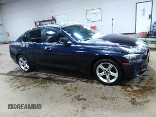 2014 BMW 3 Series 328i xDrive with VIN WBA3B3C57EF545372, listed as a IAAI auction lot 42078980 with 116,627 mi miles and . Bid and sale history available at carsss.com. Image 13.