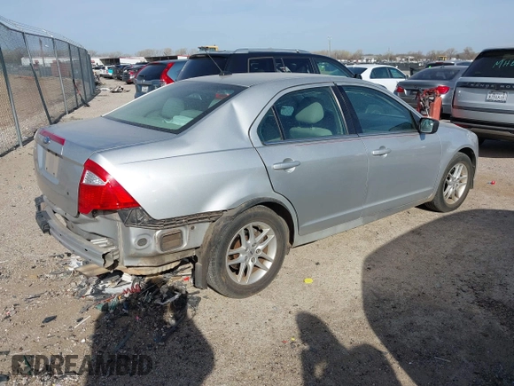 2012 Ford Fusion S with VIN 3FAHP0GA2CR143572, listed as a IAAI auction lot 41826526 with 199,083 mi miles. Bid and sale history available at carsss.com. Image 4.