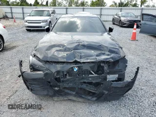 2022 BMW 4 Series 430i with VIN WBA53AP08NCJ06319, listed as a Copart auction lot 50144015 with 17,935 mi miles and Salvage Title. Bid and sale history available at carsss.com. Image 5.