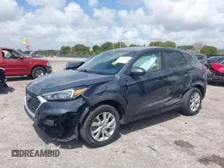 2021 Hyundai Tucson SE with VIN KM8J23A41MU291085, listed as a IAAI auction lot 41956974 with 93,932 mi miles. Bid and sale history available at carsss.com. Image 17.