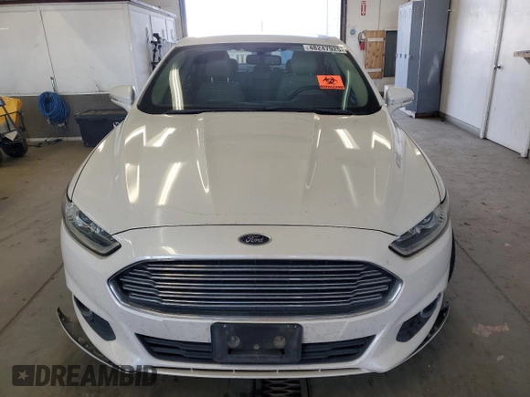 2014 Ford Fusion SE Hybrid with VIN 3FA6P0LU7ER349951, listed as a Copart auction lot 48247925 with 197,441 mi miles and Salvage Title. Bid and sale history available at DreamBid. Image 5.