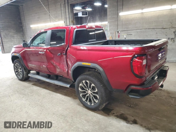 2024 GMC Canyon 4WD Denali with VIN 1GTP6FEK0R1254387, listed as a Copart auction lot 48541815 with 6,594 mi miles and Salvage Title. Bid and sale history available at carsss.com. Image 2.