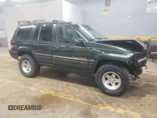 1995 Jeep Grand Cherokee Limited with VIN 1J4GZ78S7SC766726, listed as a Copart auction lot 84909134 with 174,256 mi miles and Salvage Title. Bid and sale history available at carsss.com. Image 4.