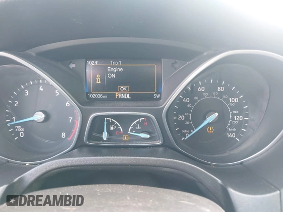 2015 Ford Focus SE with VIN 1FADP3F2XFL335884, listed as a IAAI auction lot 42582740 with 102,036 mi miles and . Bid and sale history available at DreamBid. Image 7.