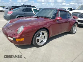1996 Porsche 911 with VIN WP0AA2998TS321999, listed as a Copart auction lot 75216174 with 66,121 mi miles and Salvage title. Bid and sale history available at DreamBid. Image 1.