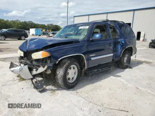 2002 GMC Yukon SLT with VIN 1GKEC13Z02R302548, listed as a Copart auction lot 74178344 with 120,174 mi miles and Salvage Title. Bid and sale history available at carsss.com. Image 1.