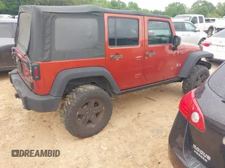 2009 Jeep Wrangler Unlimited X с VIN 1J4GA39169L735418, выставлен на аукционе IAAI как лот 42112488 с пробегом 158 127 миль миль и . История ставок и продаж доступна на DreamBid. Изображение 4.