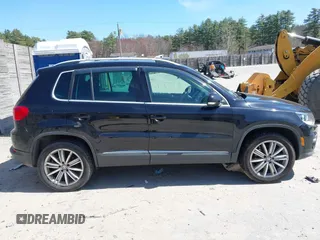 2012 Volkswagen Tiguan SEL with VIN WVGAV7AX2CW529232, listed as a IAAI auction lot 41955121 with 164,885 mi miles and . Bid and sale history available at DreamBid. Image 13.