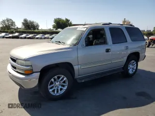 2004 Chevrolet Tahoe LS with VIN 1GNEC13T14J290183, listed as a Copart auction lot 59544415 with 145,251 mi miles and Salvage title. Bid and sale history available at DreamBid. Image 1.