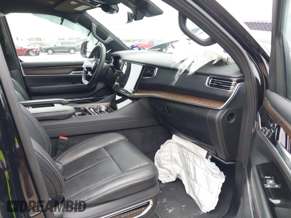 2024 Jeep Grand Wagoneer with VIN 1C4SJSEP3RS109884, listed as a IAAI auction lot 42603585 with 43,344 mi miles and . Bid and sale history available at DreamBid. Image 5.