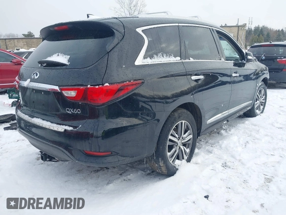 2016 Infiniti QX60 with VIN 5N1AL0MM9GC530142, listed as a IAAI auction lot 40989376 with 116,782 mi miles and . Bid and sale history available at DreamBid. Image 4.