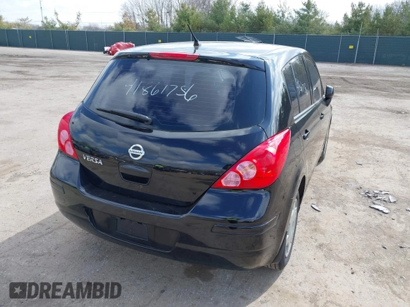 2012 Nissan Versa S with VIN 3N1BC1CP9CK290446, listed as a IAAI auction lot 41861756 with 124,883 mi miles. Bid and sale history available at carsss.com. Image 4.