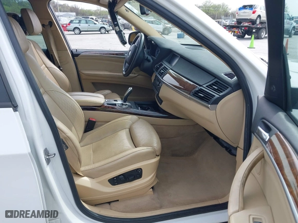 2010 BMW X5 35d with VIN 5UXFF0C52ALT75063, listed as a IAAI auction lot 41924828 with 104,513 mi miles. Bid and sale history available at carsss.com. Image 5.