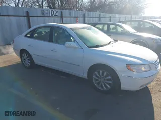 2007 Hyundai Azera SE with VIN KMHFC46F37A177646, listed as a IAAI auction lot 41347297 with 154,000 mi miles. Bid and sale history available at carsss.com. Image 1.