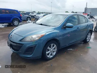 2011 Mazda 3 i Touring with VIN JM1BL1VG2B1425700, listed as a IAAI auction lot 42084171 with 162,310 mi miles. Bid and sale history available at carsss.com. Image 2.
