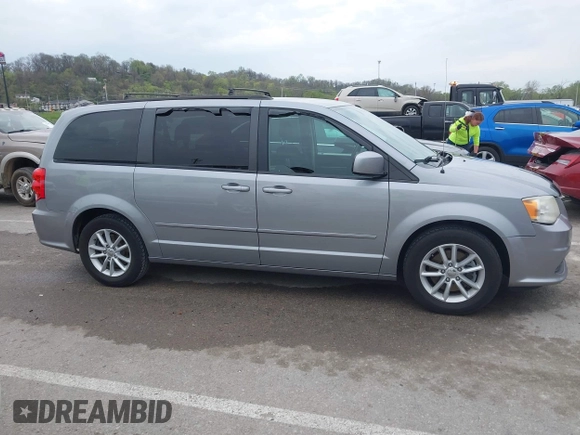 2014 Dodge Grand Caravan SXT with VIN 2C4RDGCG0ER417662, listed as a IAAI auction lot 41933279 with 156,751 mi miles and . Bid and sale history available at DreamBid. Image 13.